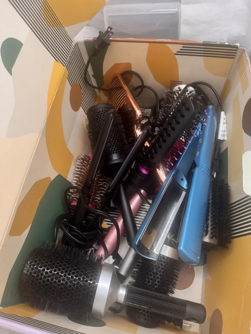 Assortment of round brushes and flat irons!